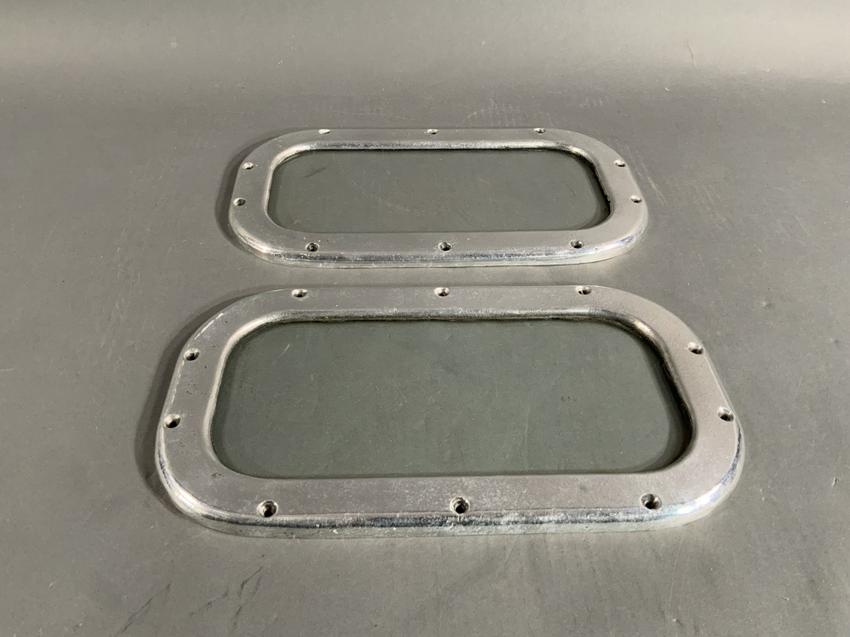 Pair Of Aluminum Ships Windows - Lannan Gallery