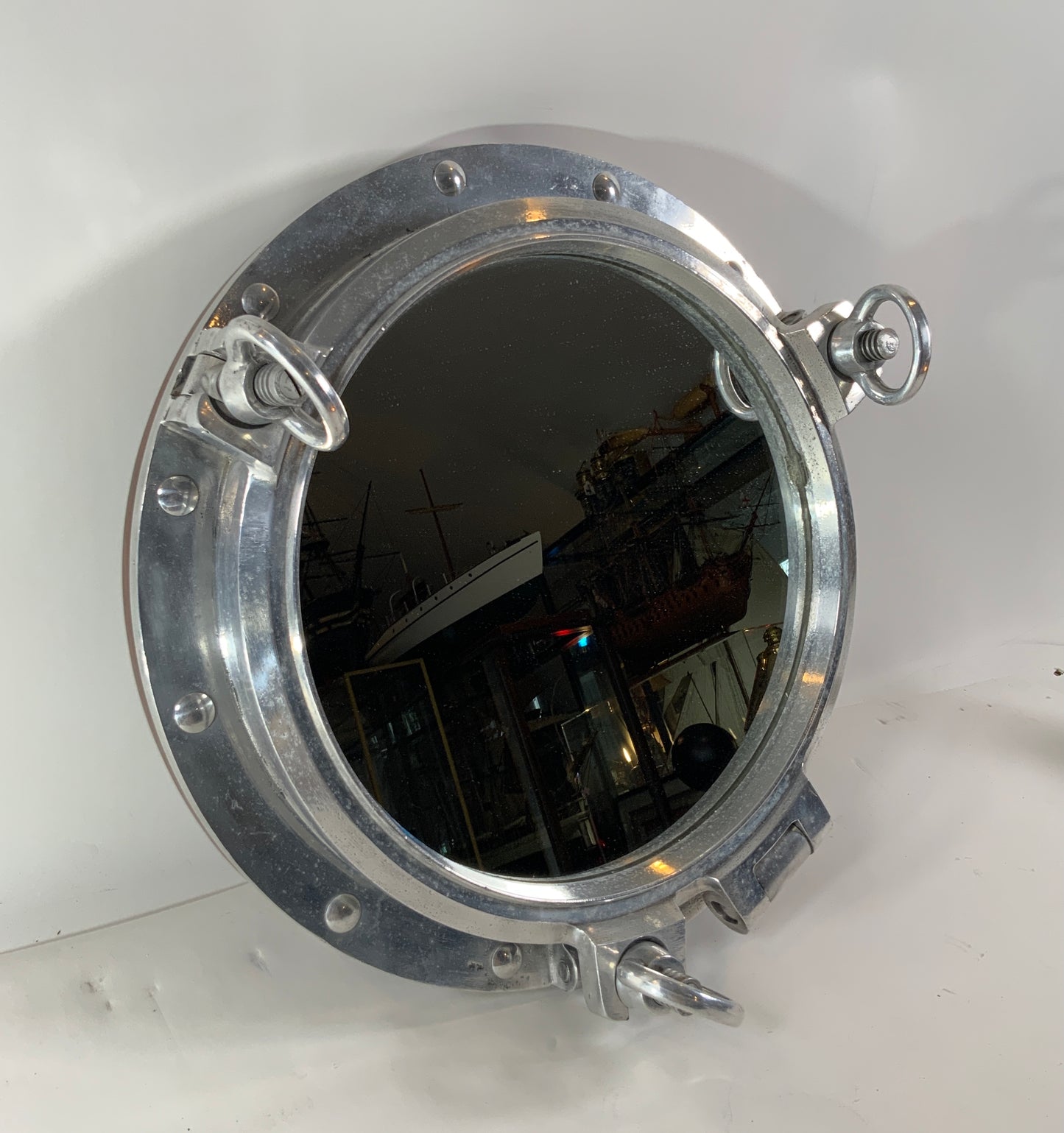 23 Inch Aluminum Ship’s Porthole Mirror - Lannan Gallery