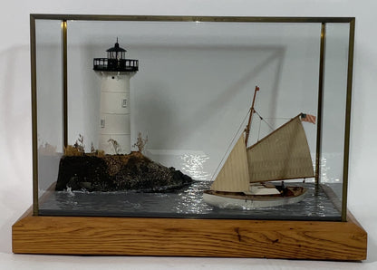 Cased Diorama of a Sloop Passing a Lighthouse
