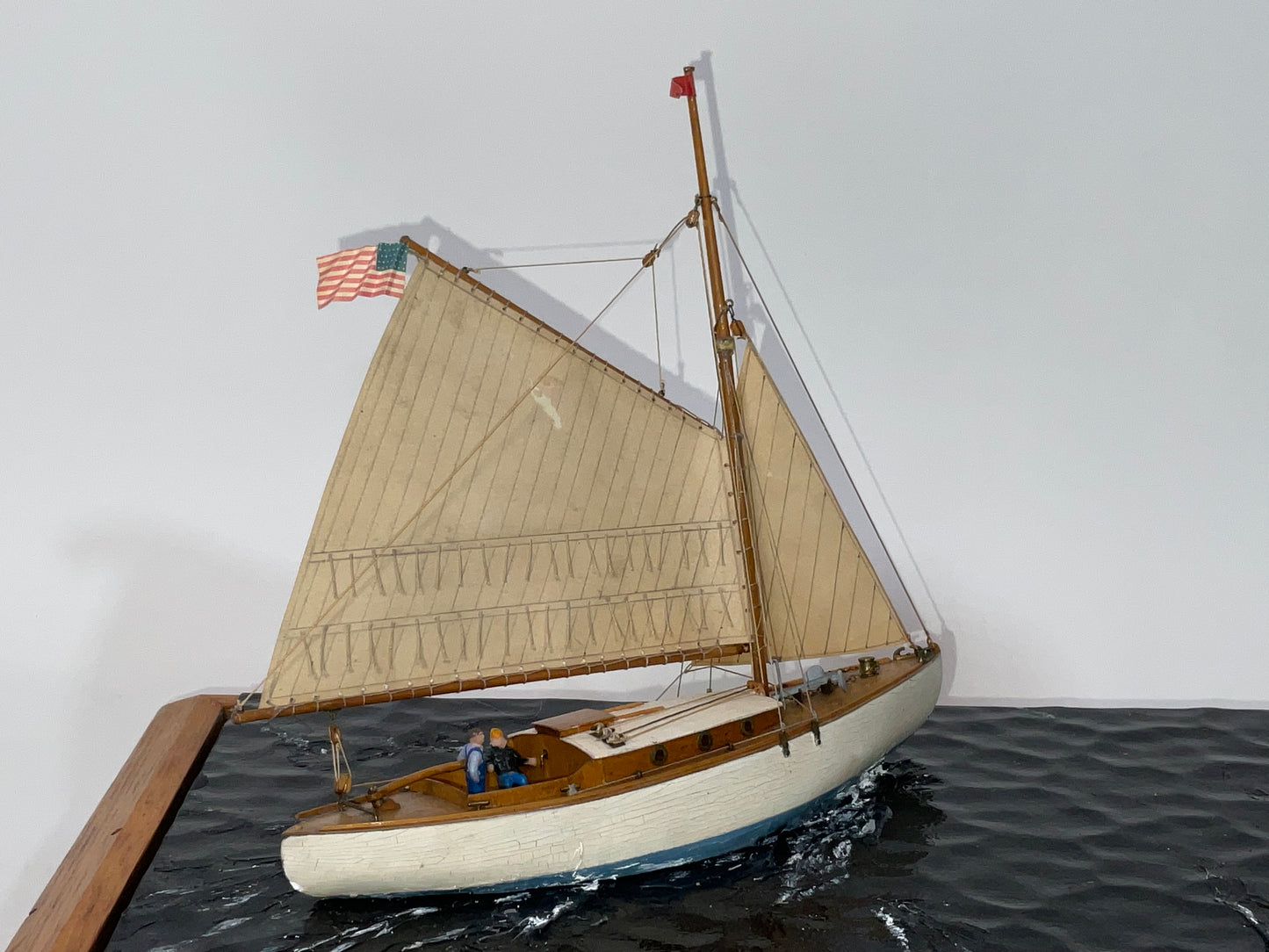 Cased Diorama of a Sloop Passing a Lighthouse