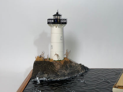 Cased Diorama of a Sloop Passing a Lighthouse