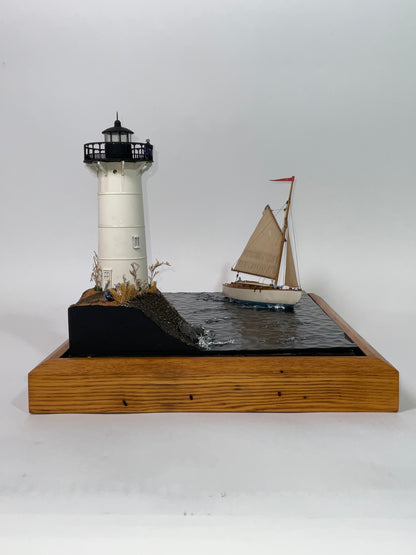 Cased Diorama of a Sloop Passing a Lighthouse