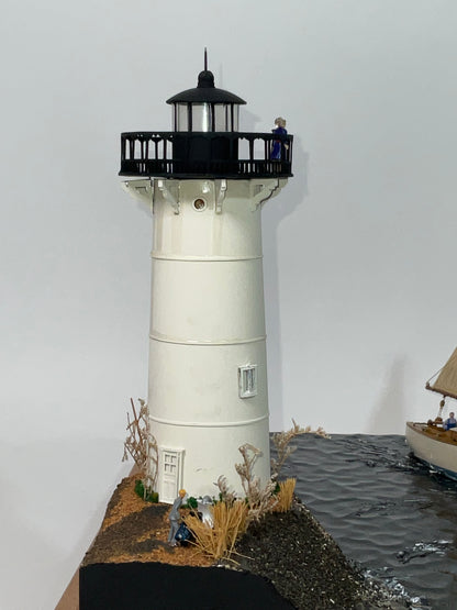Cased Diorama of a Sloop Passing a Lighthouse