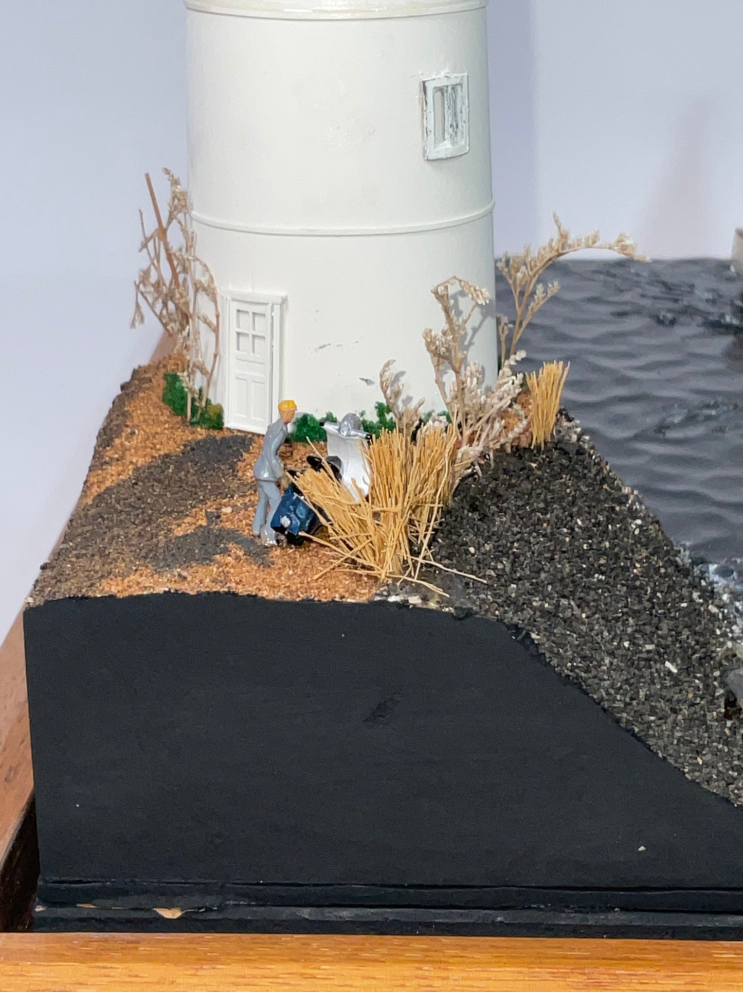 Cased Diorama of a Sloop Passing a Lighthouse