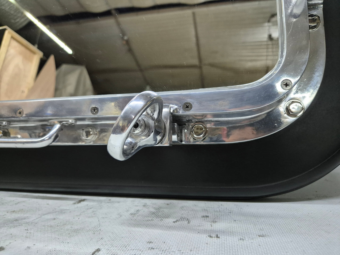 Ship's Porthole Transformed into a Wall Mounted Mirror