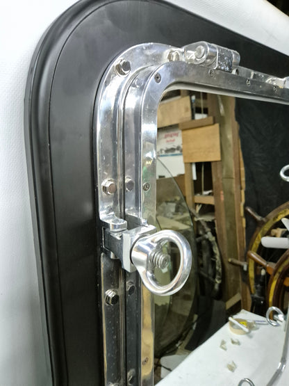 Ship's Porthole Transformed into a Wall Mounted Mirror