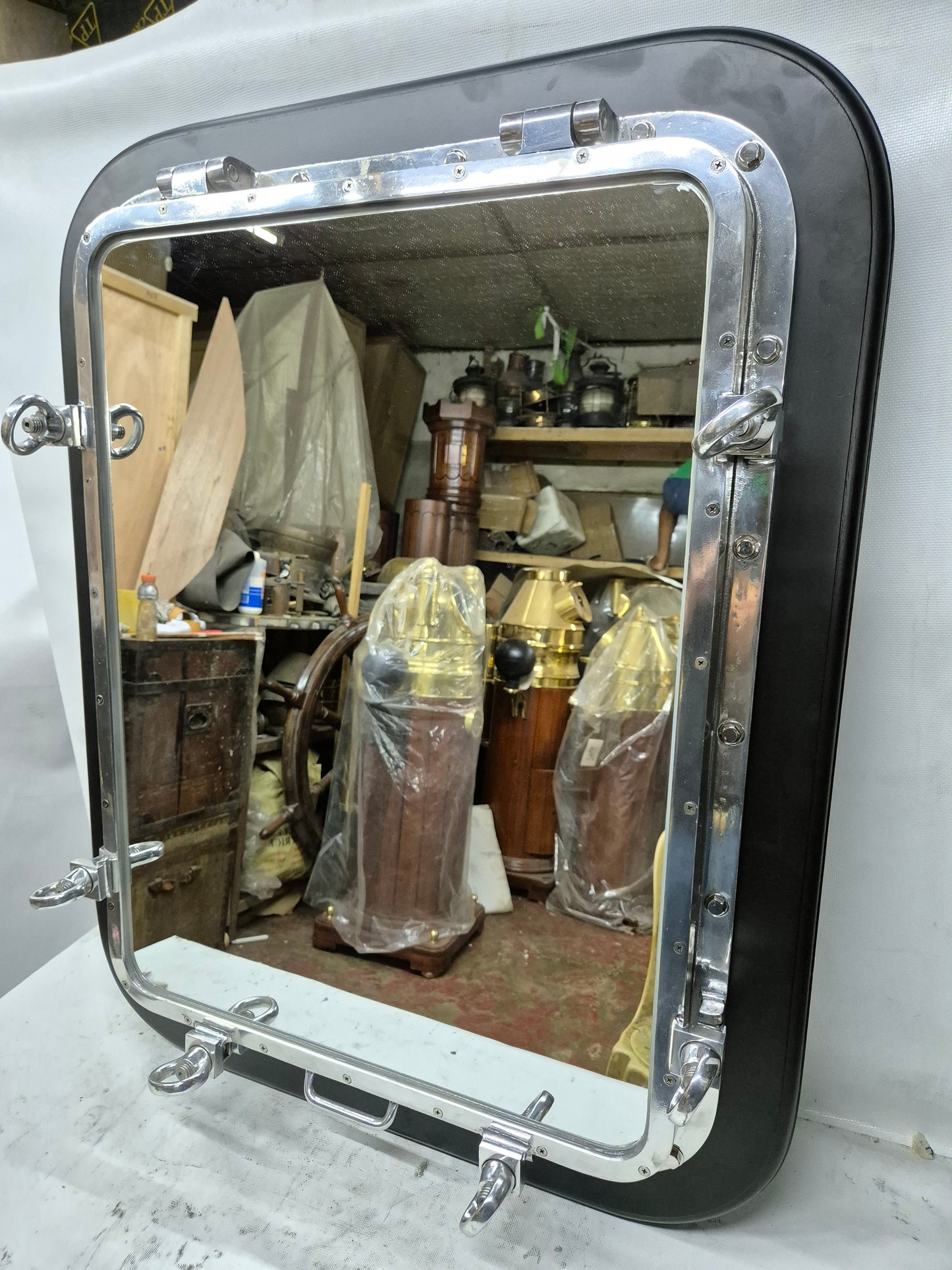 Ship's Porthole Transformed into a Wall Mounted Mirror