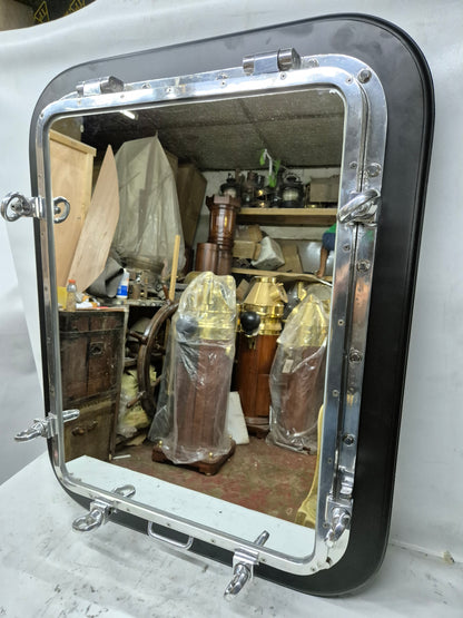 Ship's Porthole Transformed into a Wall Mounted Mirror