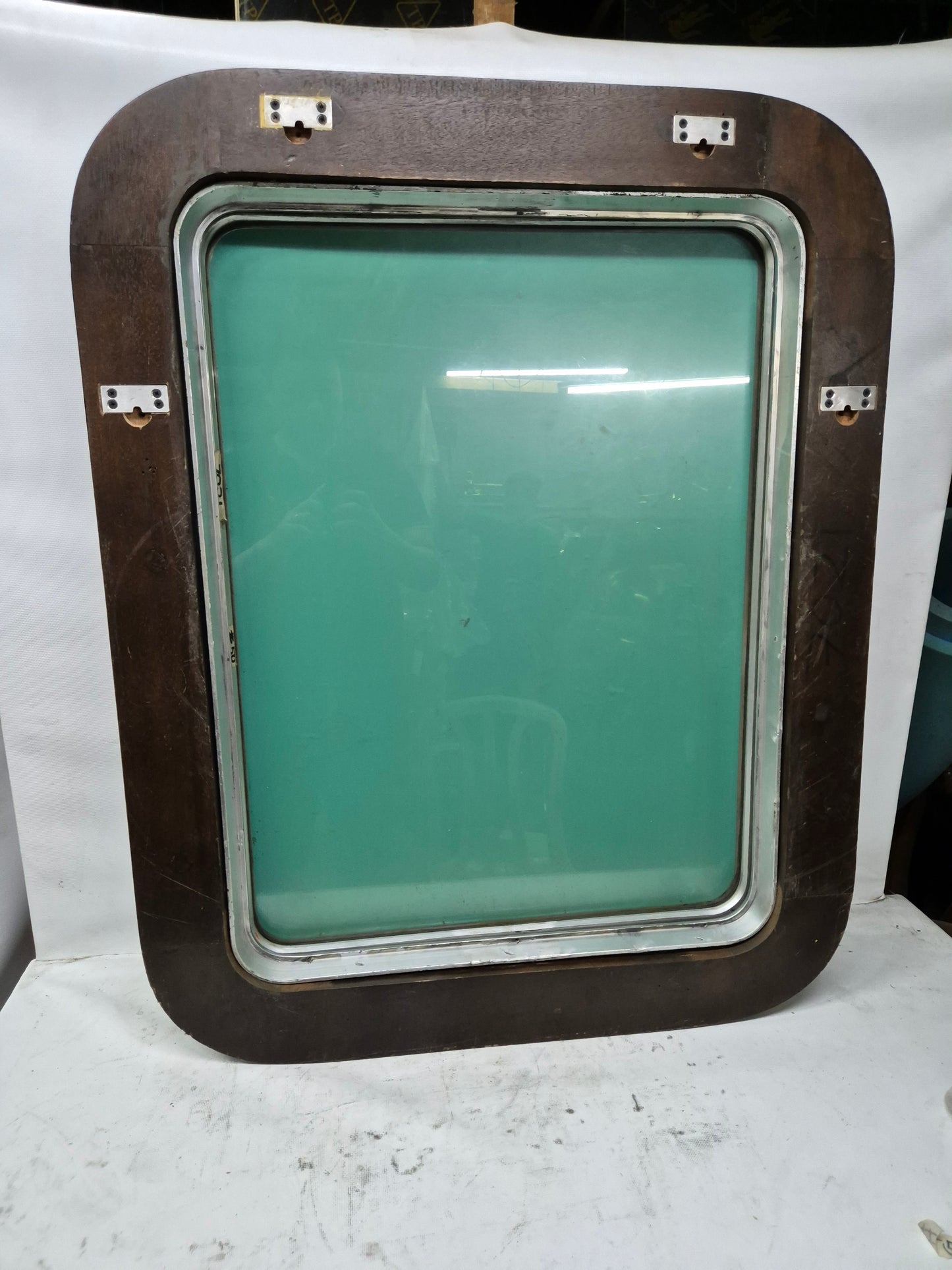 Ship's Porthole Transformed into a Wall Mounted Mirror