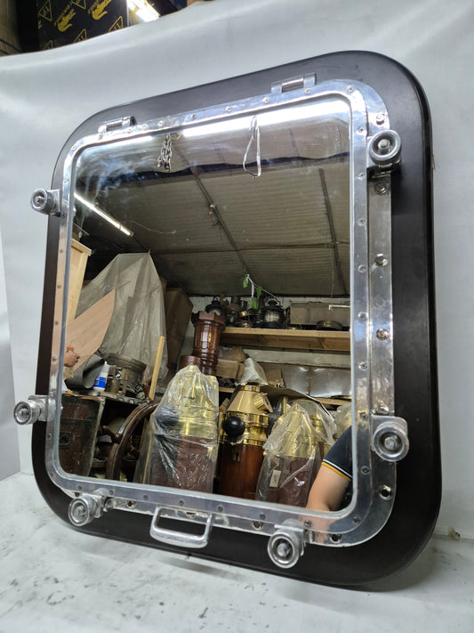 Ship's Porthole Transformed into a Wall Mounted Mirror