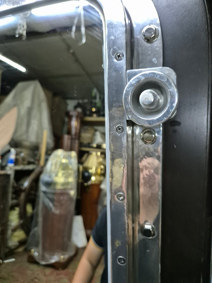 Ship's Porthole Transformed into a Wall Mounted Mirror