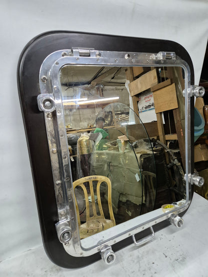 Ship's Porthole Transformed into a Wall Mounted Mirror