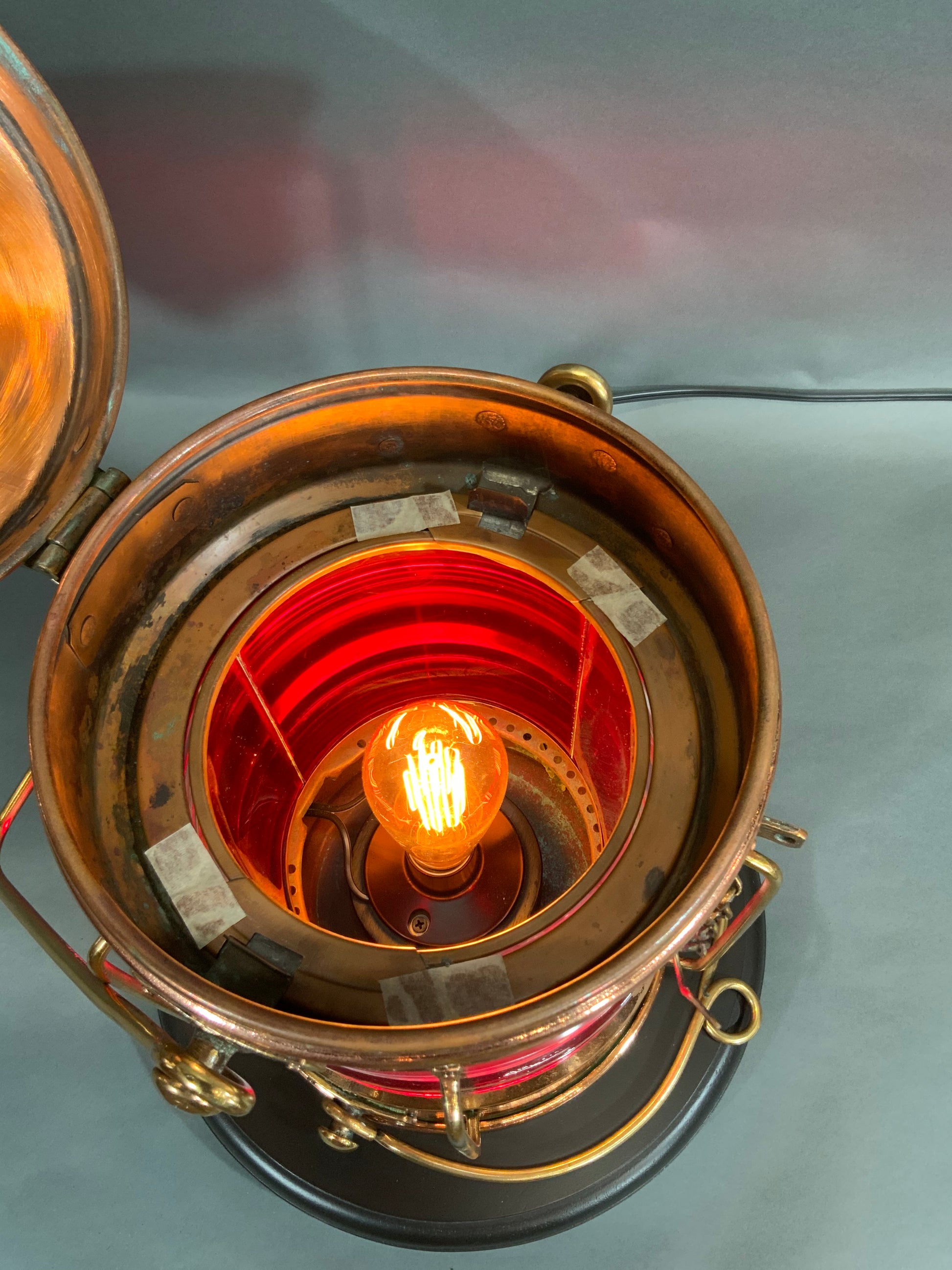 Copper "Not Under Command" Ship's Lantern with Glass Fresnel Lens by Meteorite - Lannan Gallery