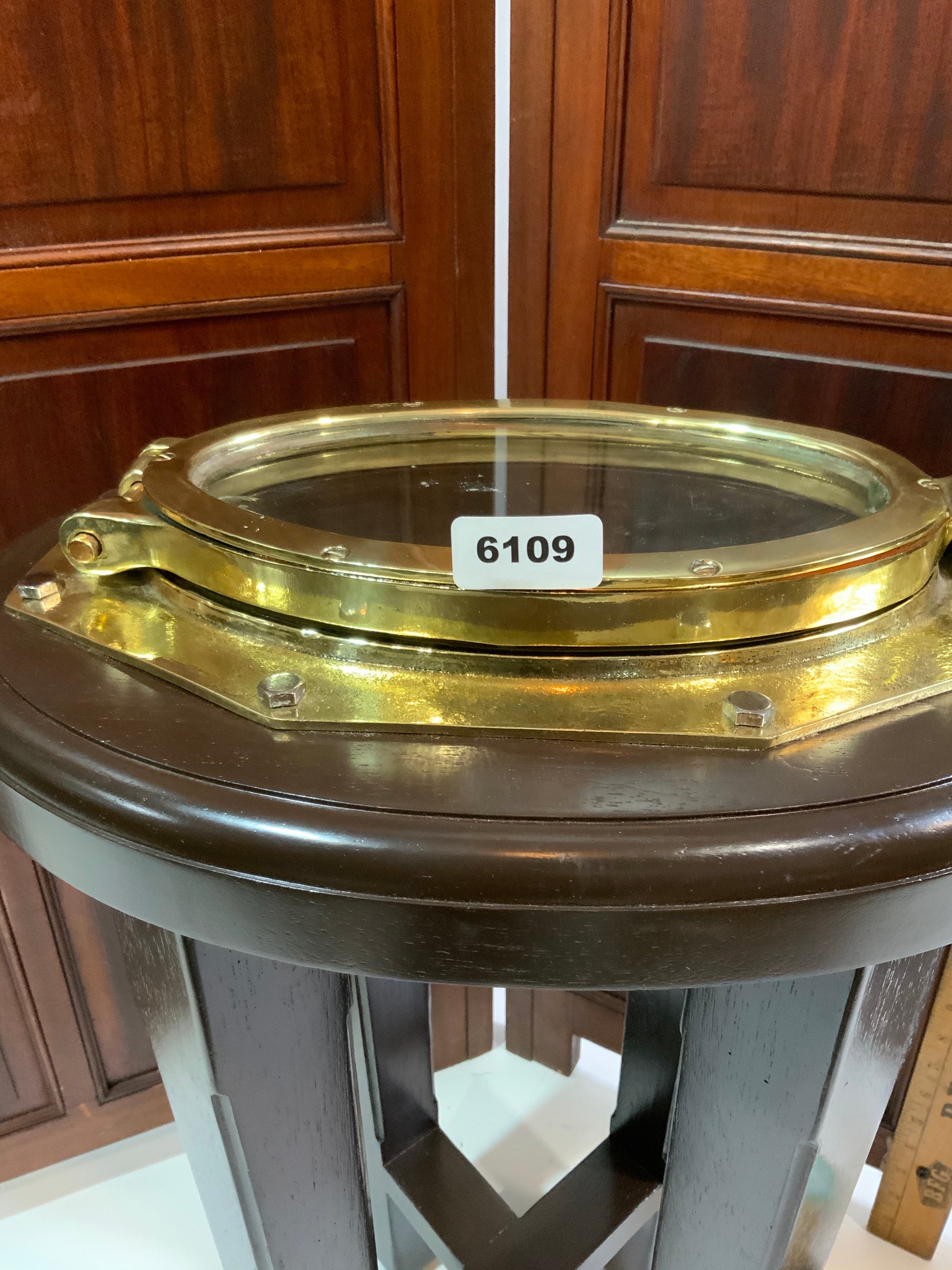Solid Brass Ships Porthole Mounted To A Mahogany Table Base - Lannan Gallery